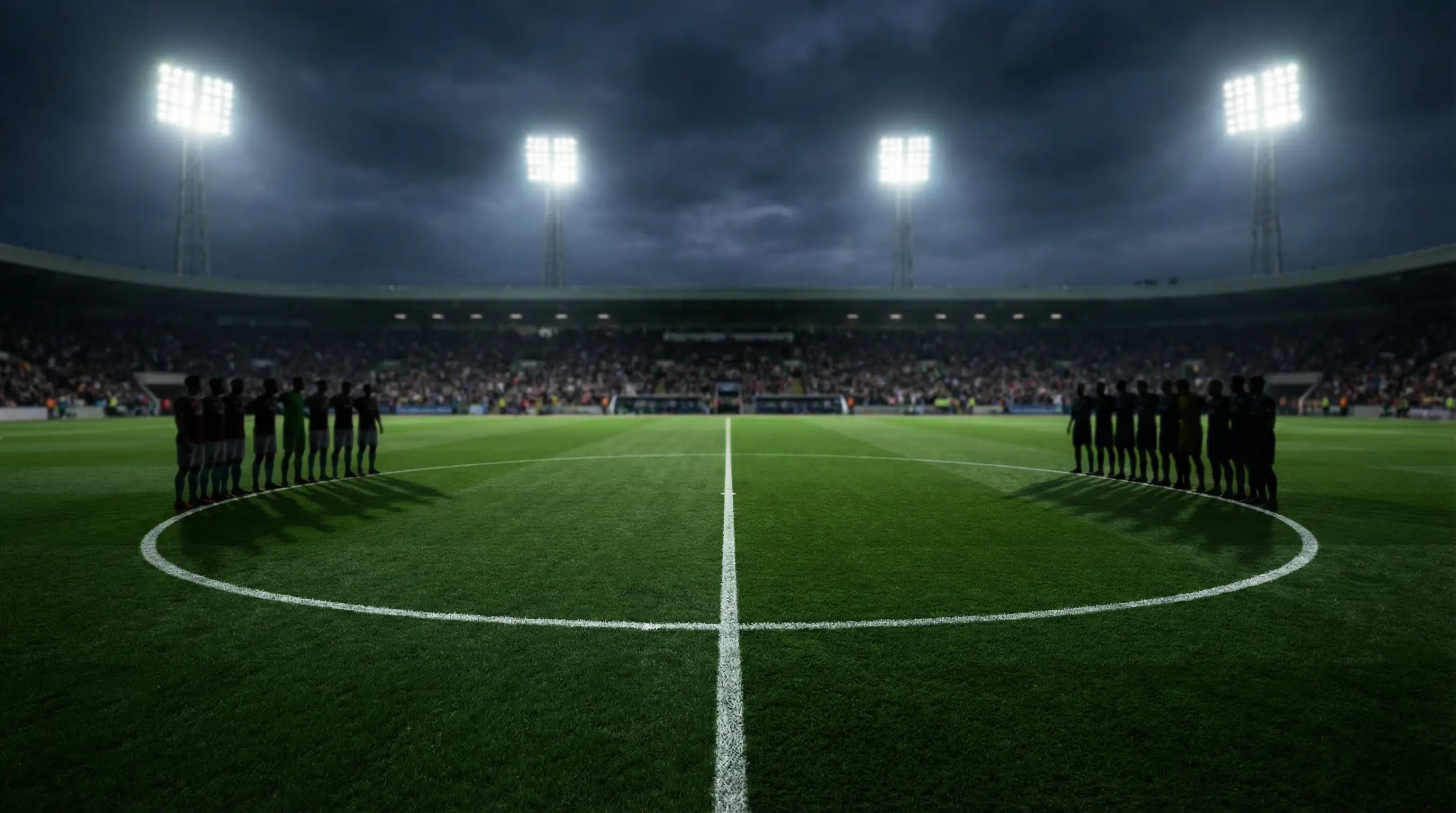 Anstoß im Mittelkreis bei einem WM-2026-Gruppenspiel auf gepflegtem Rasen